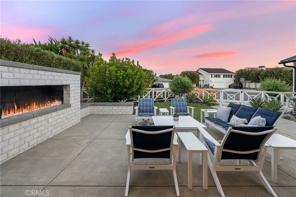 1231 Sand Key Corona del Mar, CA 92625 - Photo 20 of 65 a view of a patio with a table and chairs