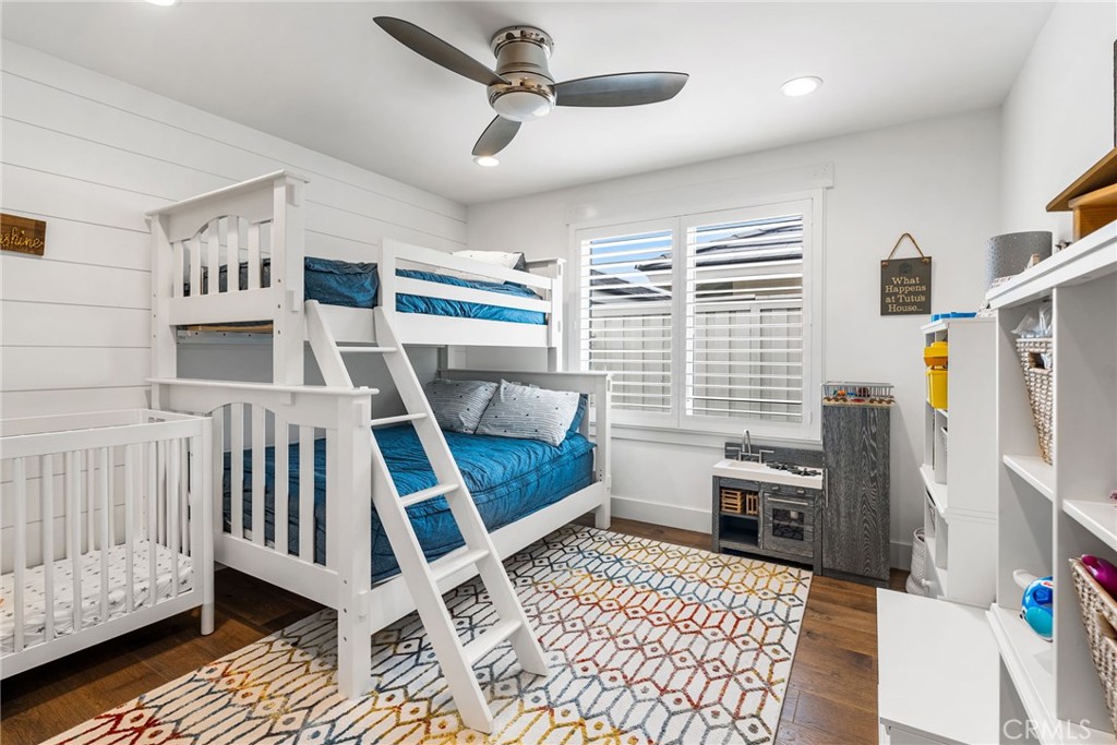 1231 Sand Key Corona del Mar, CA 92625 - Photo 47 of 65 a bedroom with furniture and a window