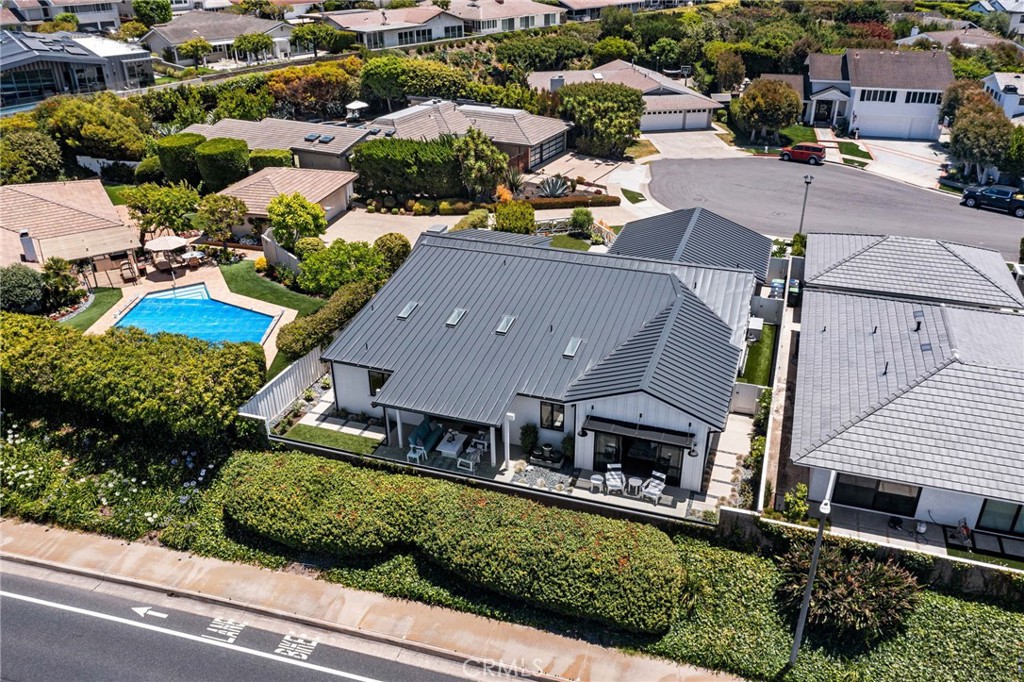 1231 Sand Key Corona del Mar, CA 92625 - Photo 63 of 65 an aerial view of multiple houses with a yard