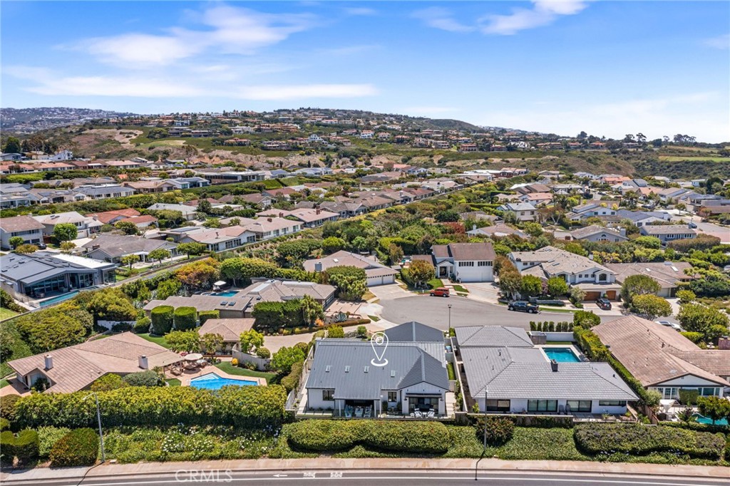 1231 Sand Key Corona del Mar, CA 92625 - Photo 64 of 65 an aerial view of residential houses with outdoor space