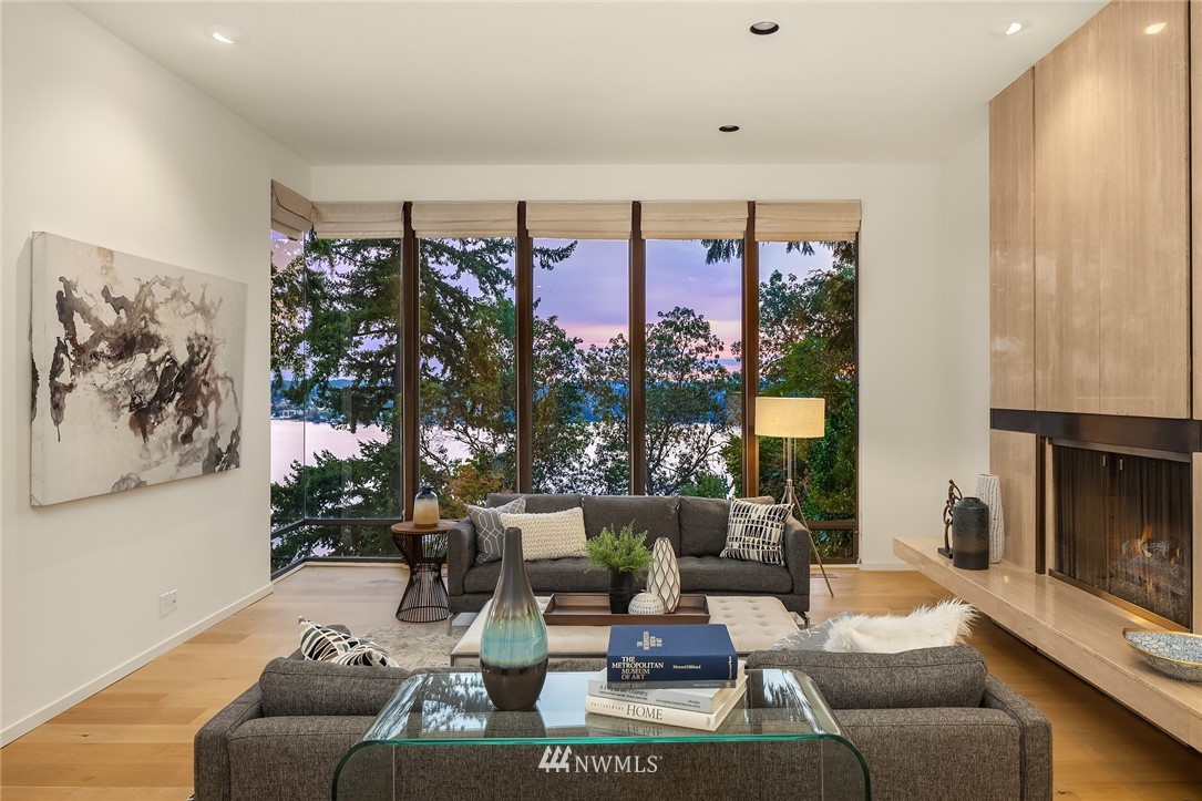 7701 Ridgecrest Lane Mercer Island, WA 98040 - Photo 14 of 35 a living room with furniture and a large window