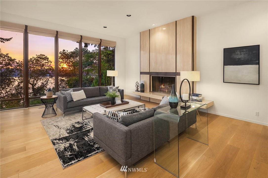 7701 Ridgecrest Lane Mercer Island, WA 98040 - Photo 15 of 35 a living room with furniture and a large window