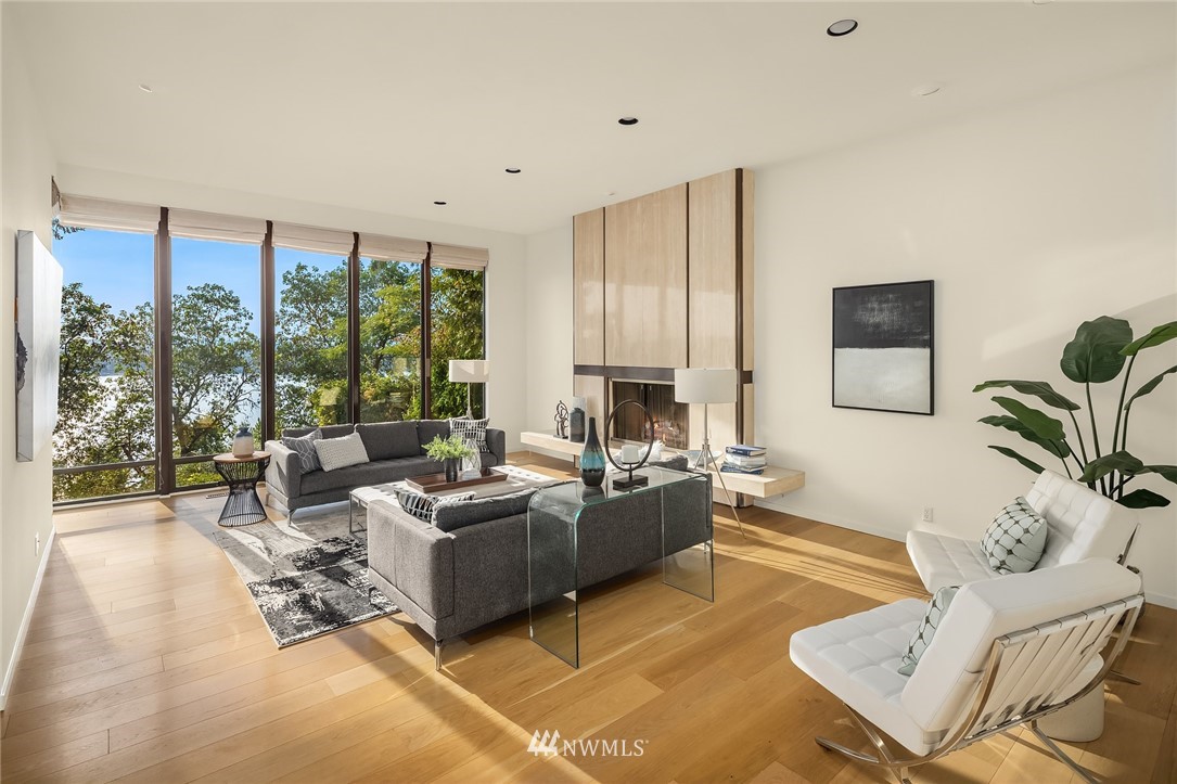7701 Ridgecrest Lane Mercer Island, WA 98040 - Photo 16 of 35 a living room with furniture and a large window
