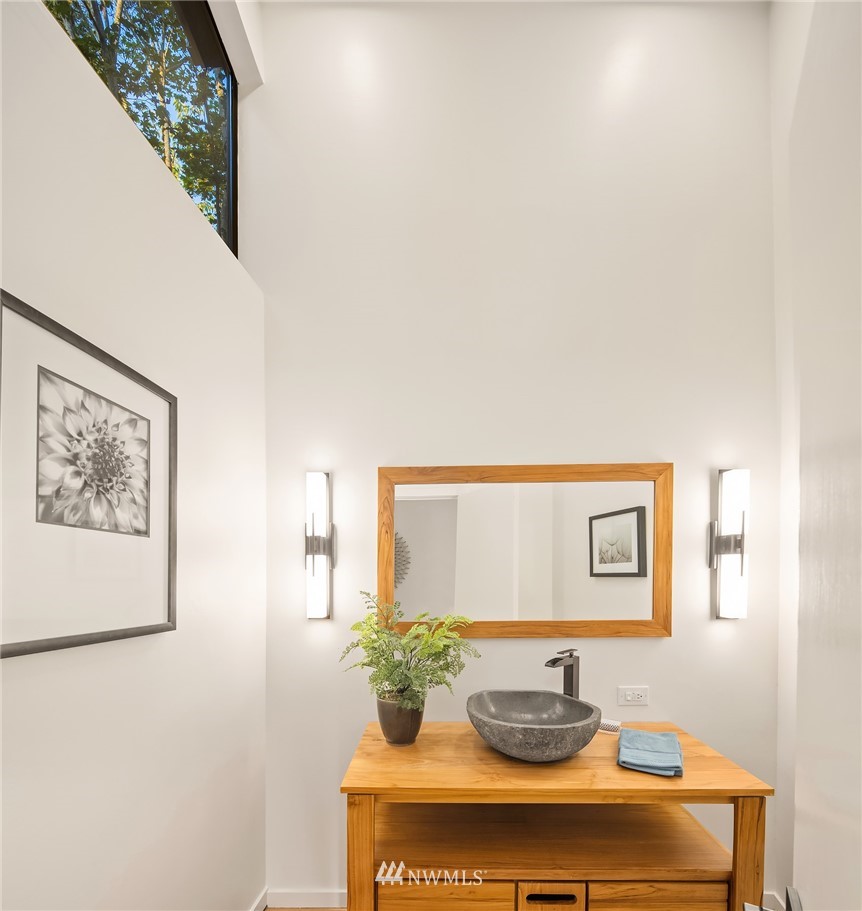 7701 Ridgecrest Lane Mercer Island, WA 98040 - Photo 35 of 35 a vase of flowers sitting on a table