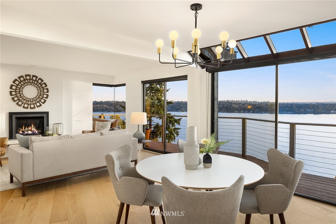 7701 Ridgecrest Lane Mercer Island, WA 98040 - Photo 7 of 35 a view of a dining room with furniture window and wooden floor
