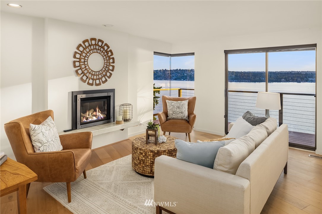 7701 Ridgecrest Lane Mercer Island, WA 98040 - Photo 8 of 35 a living room with furniture and a fireplace