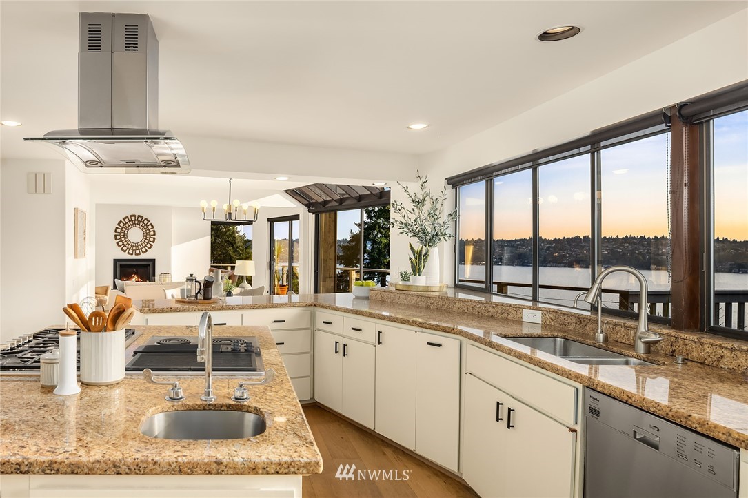 7701 Ridgecrest Lane Mercer Island, WA 98040 - Photo 9 of 35 a kitchen with a sink and lots of counter top space