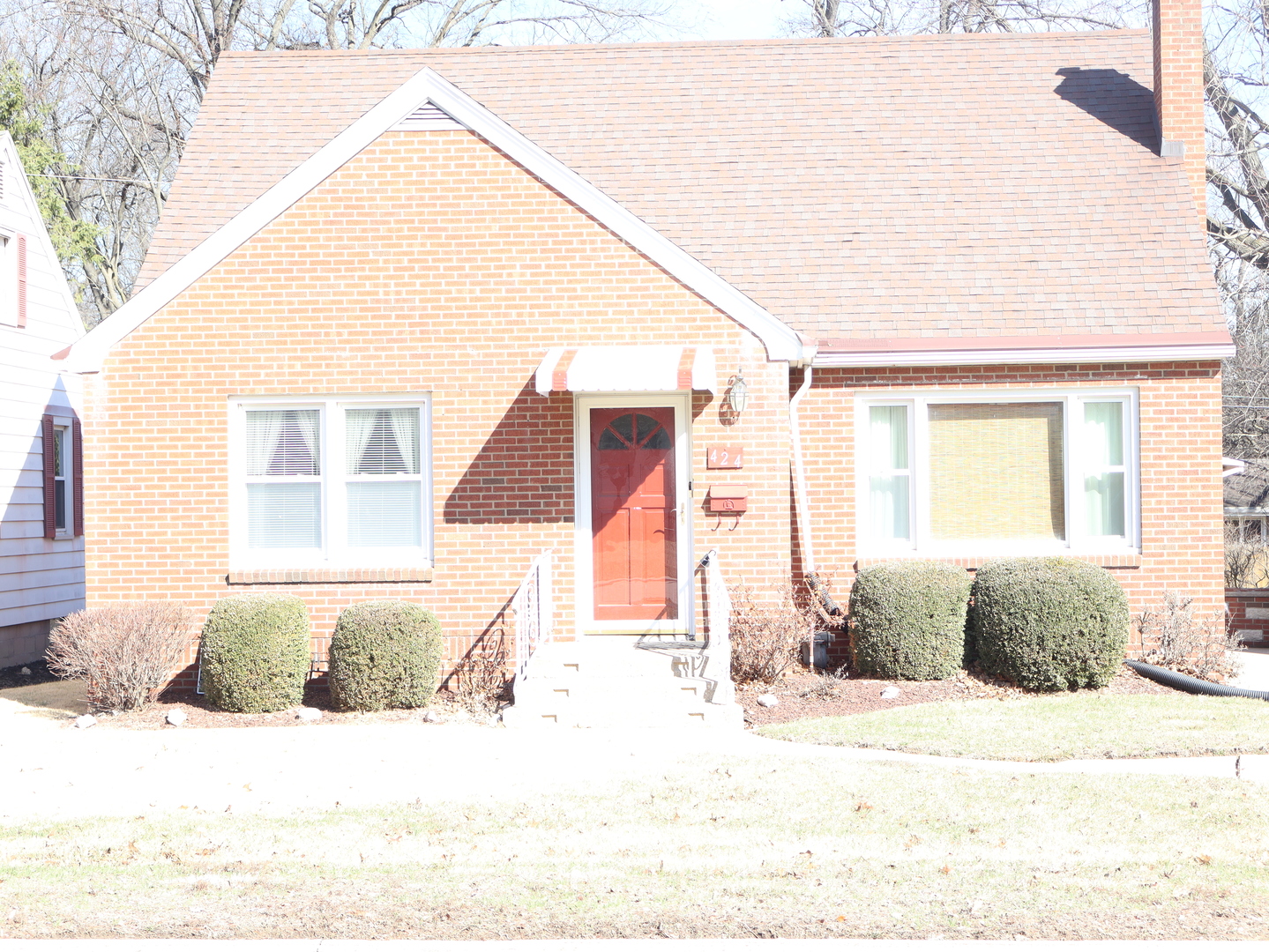 424 West Bluff Street Streator, IL 61364 - Photo 2 of 20 a view of a house with snow on the road