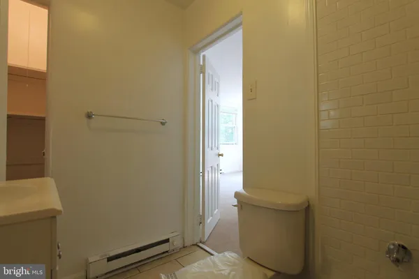 a bathroom with a sink and toilet