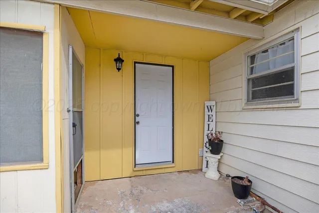 a view of front door and porch