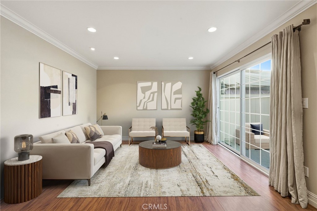 19208 Hamlin Street, Unit 5 Reseda, CA 91335 - Photo 5 of 31 a living room with furniture and a large window