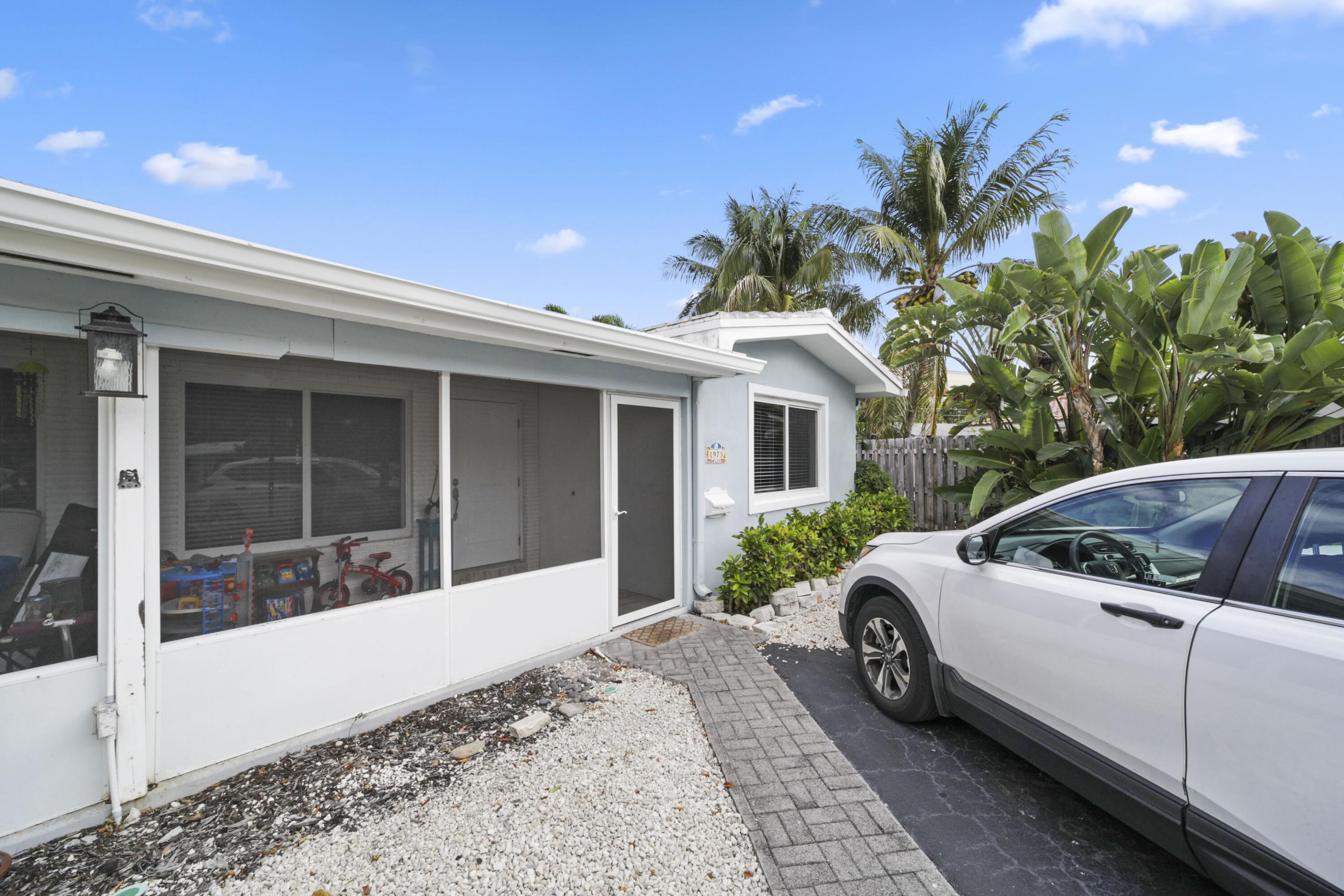 Undisclosed Address Lighthouse Point, FL 33064 - Photo 8 of 16 a house view with a backyard space