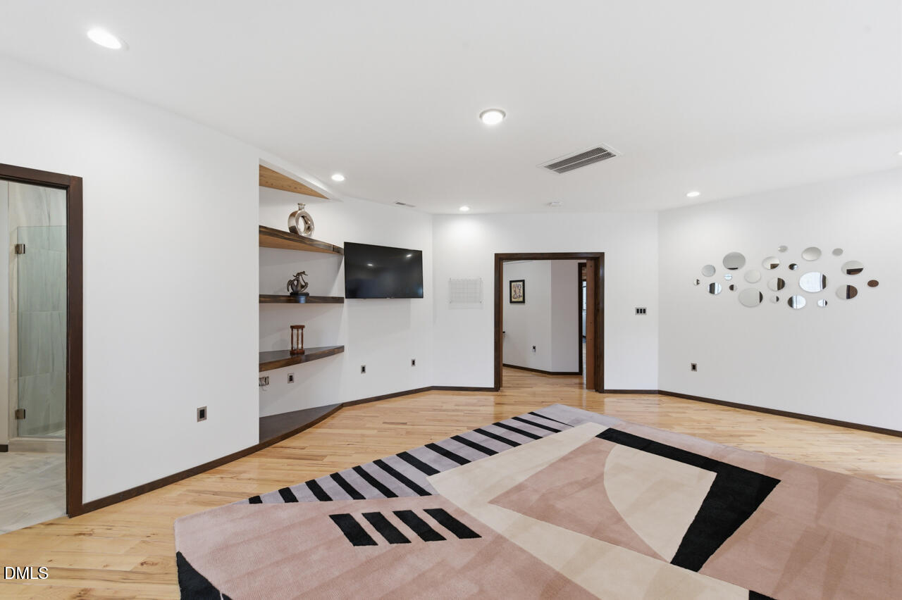 3315 Denada Path Durham, NC 27707 - Photo 28 of 74 a living room with hard wood floor