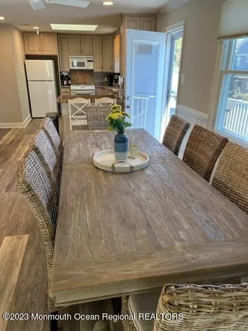 a kitchen with a sink appliances and cabinets