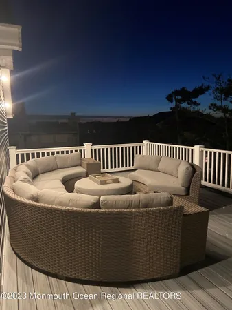 a view of sitting area in back of house