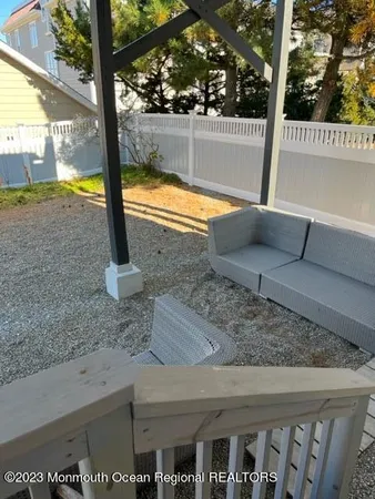 a view of a back yard from a balcony