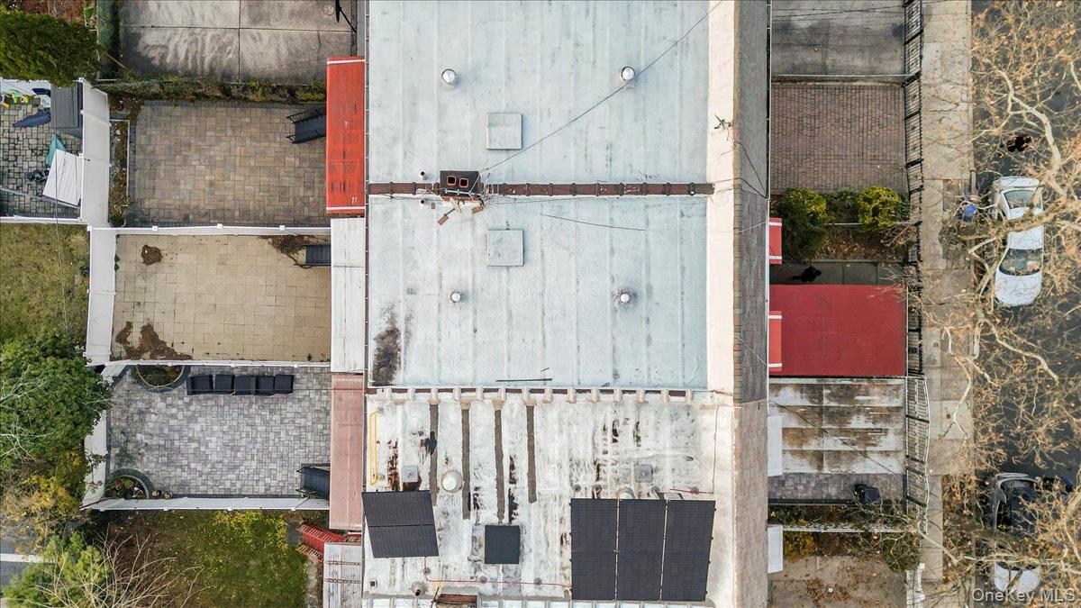 4183 Murdock Avenue Bronx, NY 10466 - Photo 19 of 22 aerial view of a house with wooden fence