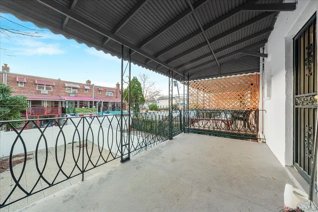 a view of a balcony with city view
