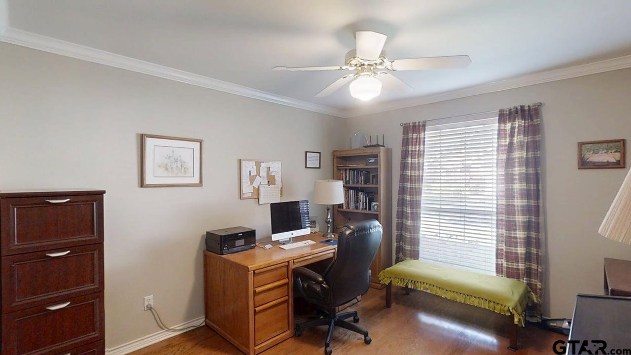1202 Rice Road, Unit 143 Tyler, TX 75703 - Photo 18 of 27 a view of a workspace with furniture and a window