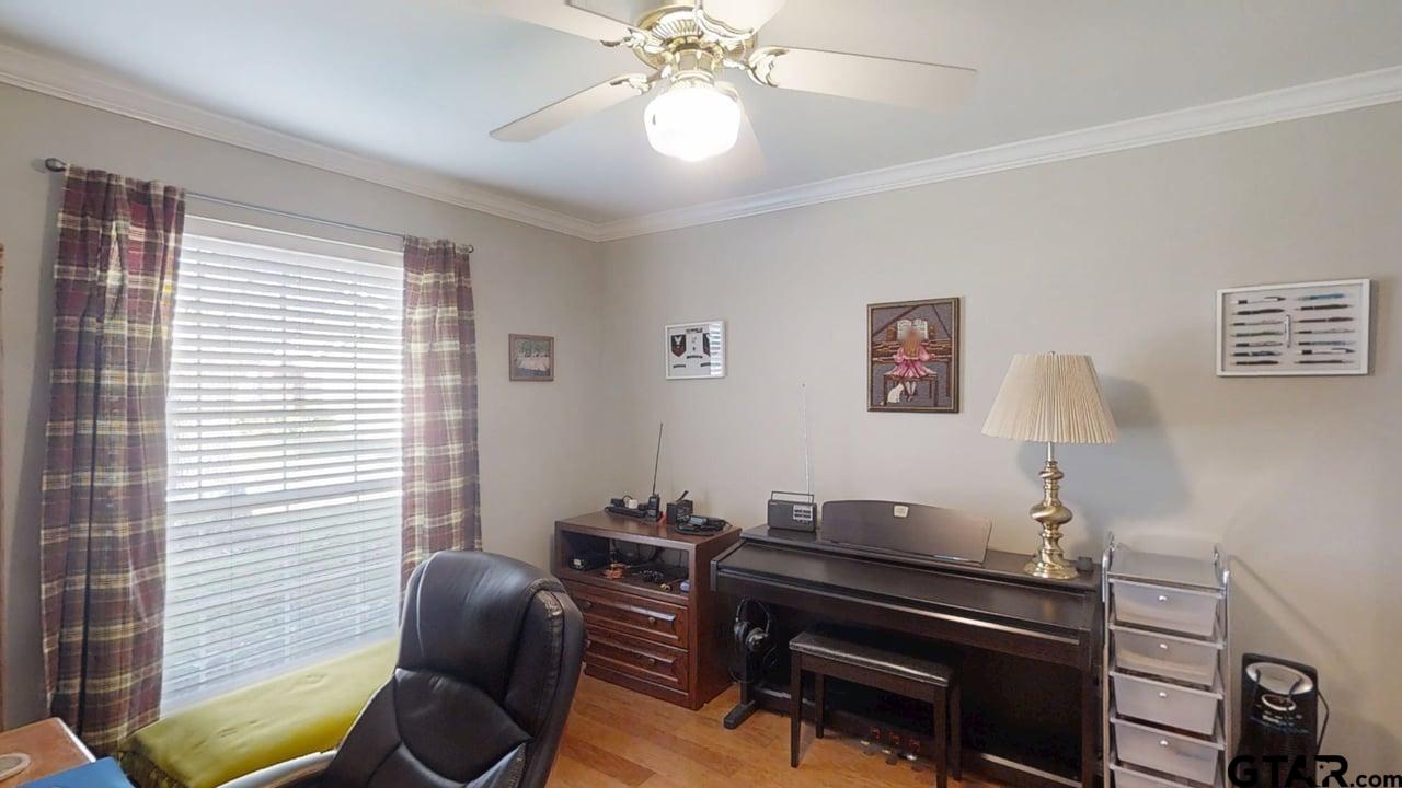 1202 Rice Road, Unit 143 Tyler, TX 75703 - Photo 19 of 27 a view of a workspace with furniture and a window