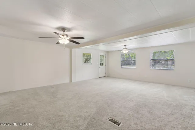 a view of a park with a tree