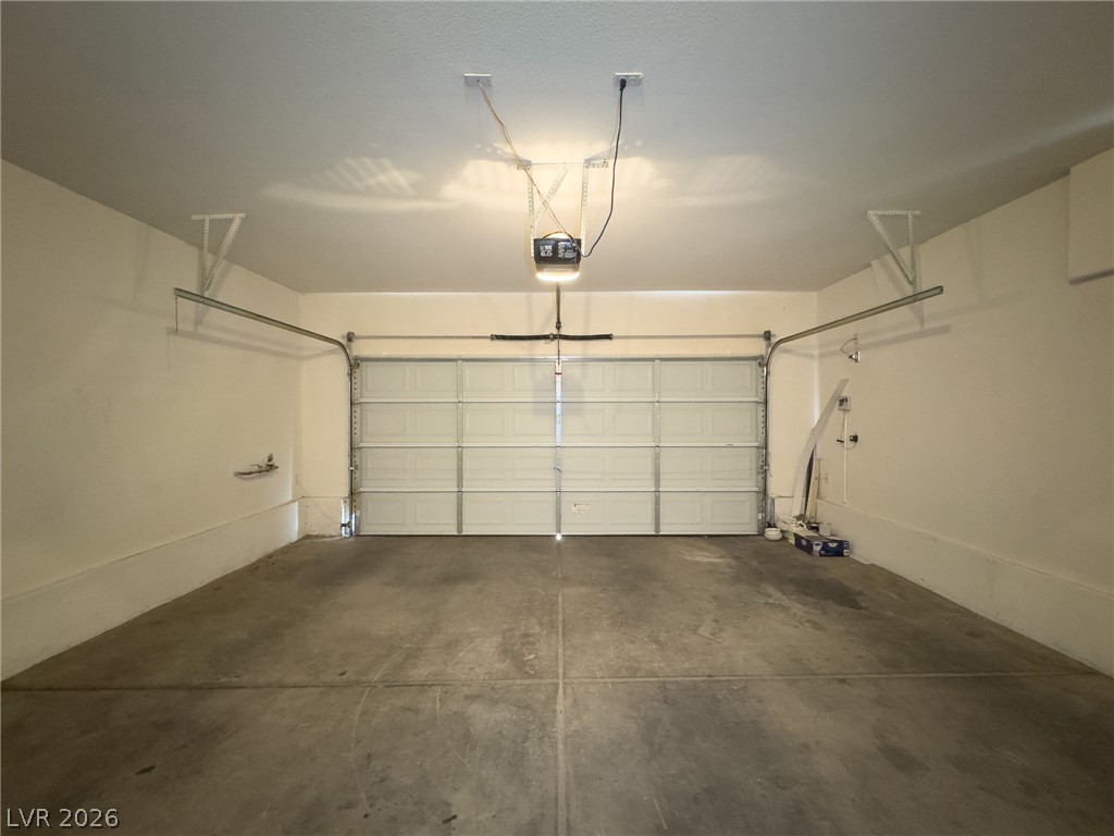 9456 Grandview Spring Avenue Las Vegas, NV 89166 - Photo 38 of 49 Secure parking solution offering convenient garage door access.