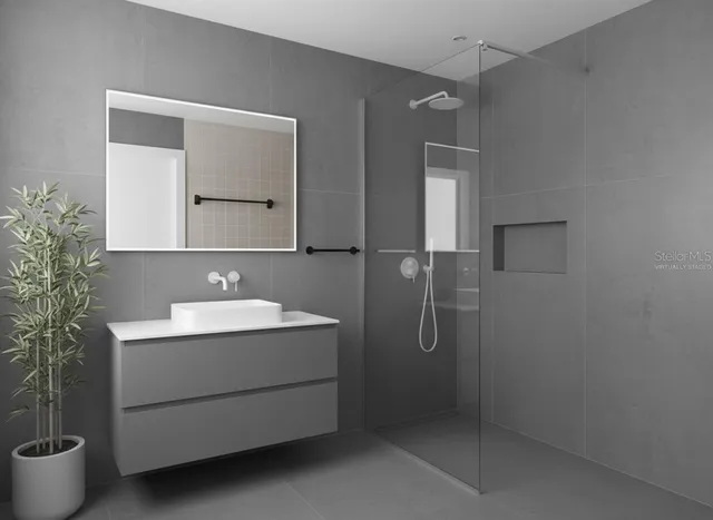 a living room with furniture a flat screen tv and a window