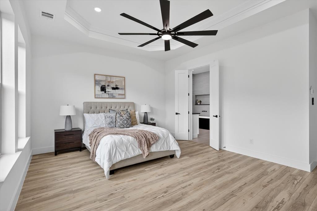 182 Briar Patch Azle, TX 76020 - Photo 17 of 36 Bedroom featuring light wood-type flooring, a ceiling fan, and recessed lighting