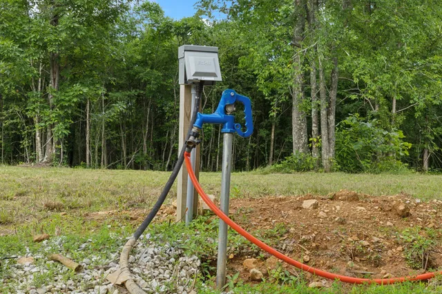 a view of a backyard with a small deck