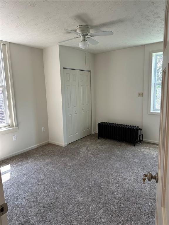 324 Ophelia Street Pittsburgh, PA 15213 - Photo 10 of 16 an empty room with windows