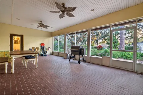 a view of a livingroom with furniture window and outside view