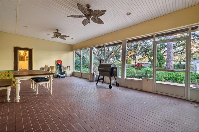 a view of a livingroom with furniture window and outside view