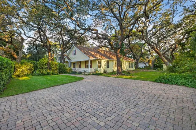 a view of house with outdoor space and street view