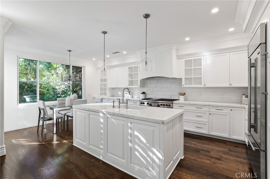18 Lyon Newport Coast, CA 92657 - Photo 12 of 55 a kitchen with appliances a sink and cabinets