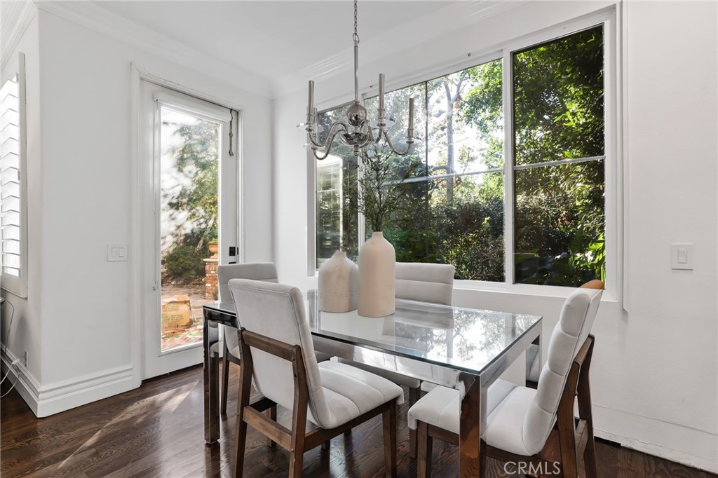 18 Lyon Newport Coast, CA 92657 - Photo 16 of 55 a view of a dining room with furniture window and wooden floor