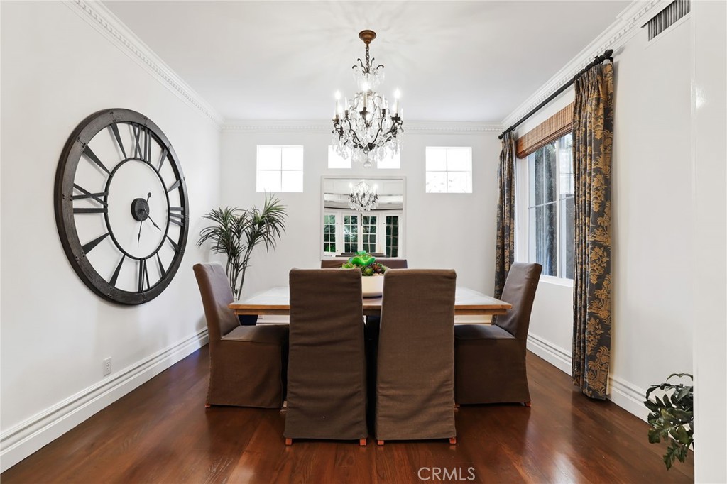 18 Lyon Newport Coast, CA 92657 - Photo 20 of 55 a view of a dining room with furniture window and wooden floor