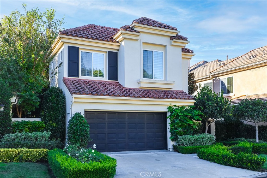 18 Lyon Newport Coast, CA 92657 - Photo 3 of 55 a view of front of house with a yard
