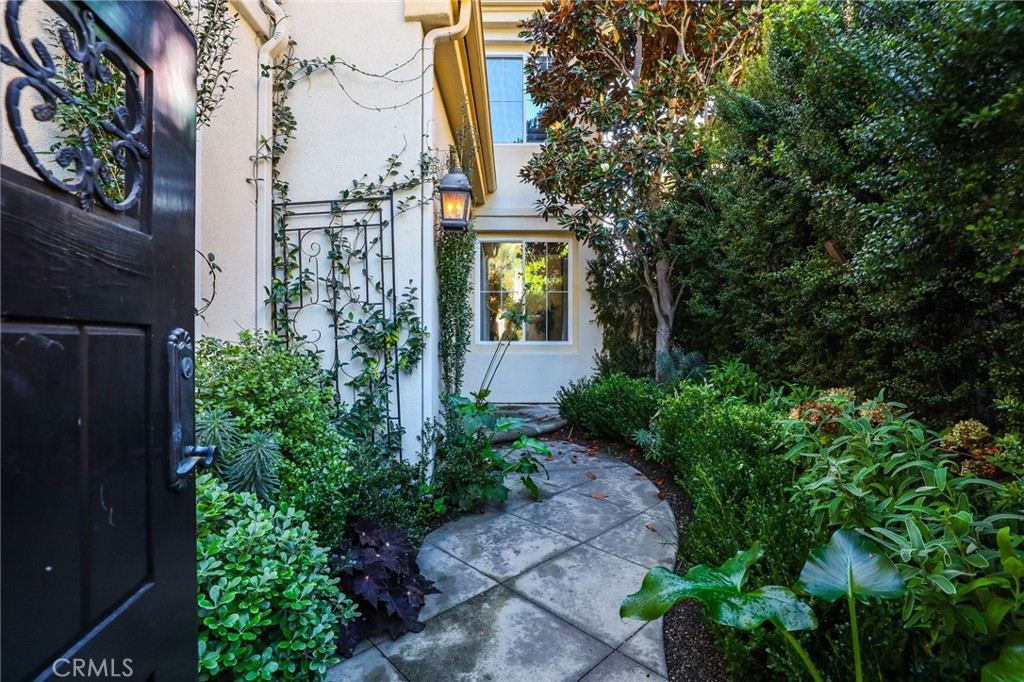 18 Lyon Newport Coast, CA 92657 - Photo 5 of 55 a view of a house with brick walls and plants