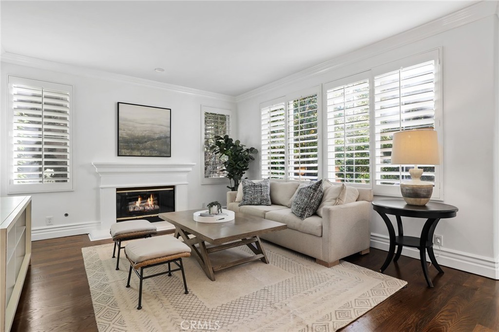 18 Lyon Newport Coast, CA 92657 - Photo 8 of 55 a living room with furniture and a fireplace