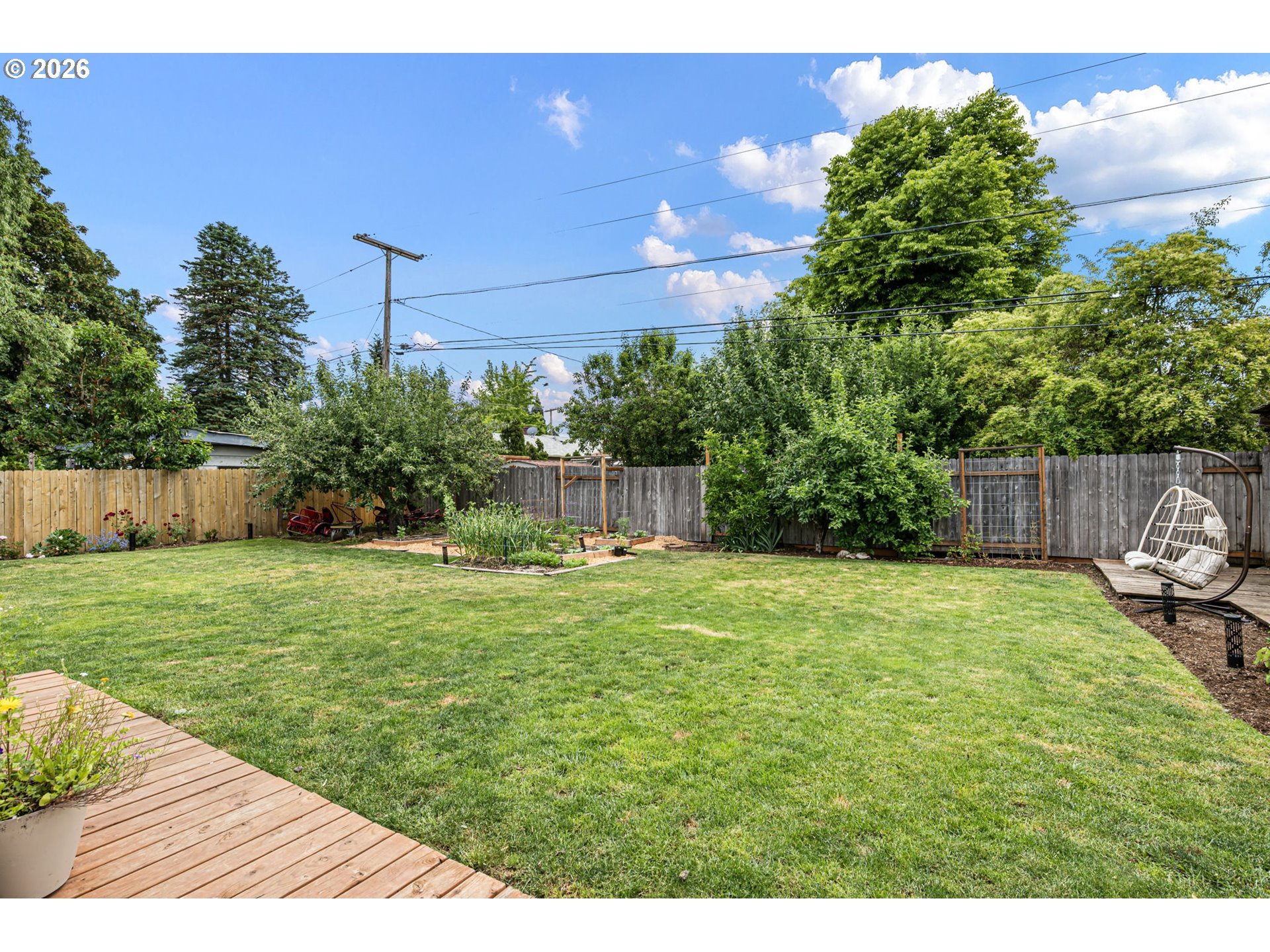 765 Louis Street Eugene, OR 97402 - Photo 43 of 45 a view of a backyard with a garden