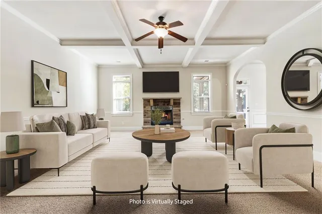 a large kitchen with a large window and stainless steel appliances