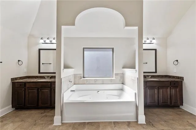 a view of a patio with couches chairs and potted plants