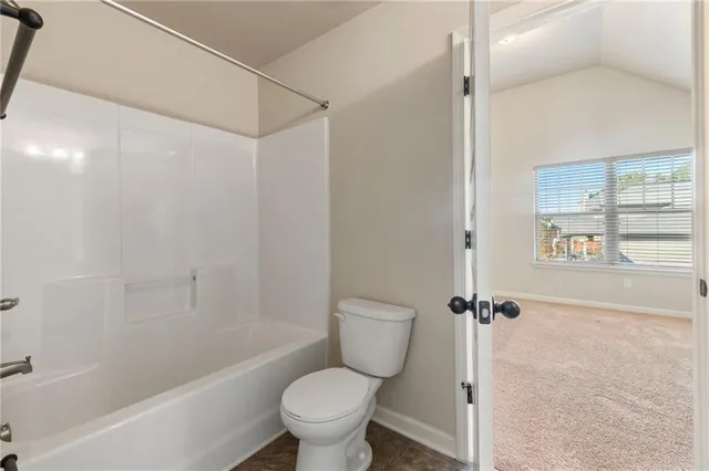 a view of a chairs and table in the patio