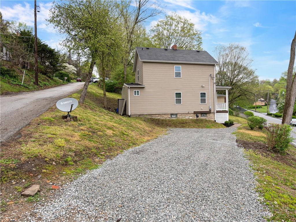 2031 Monroeville Road Monroeville, PA 15146 - Photo 4 of 25 a view of a house with backyard and garden