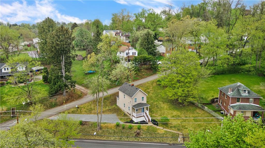 2031 Monroeville Road Monroeville, PA 15146 - Photo 7 of 25 an aerial view of a house with outdoor space and trees all around