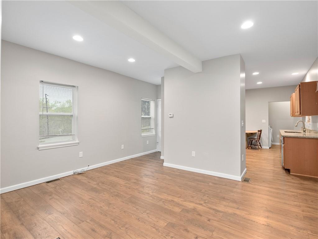 2031 Monroeville Road Monroeville, PA 15146 - Photo 10 of 25 a view of a big room with wooden floor and windows