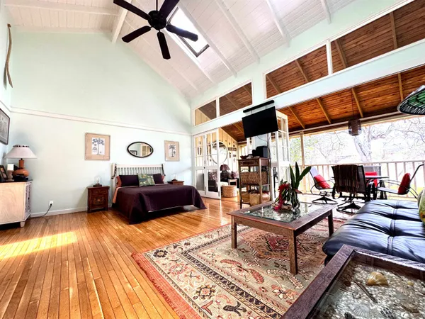 a view of a swimming pool with an outdoor space and seating area