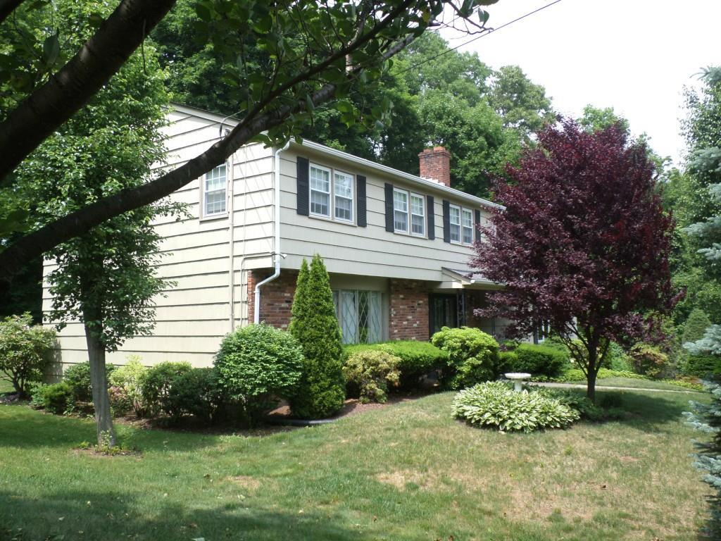 9 Windsor Road North Haven, CT 06473 - Photo 1 of 1 a front view of a house with a yard