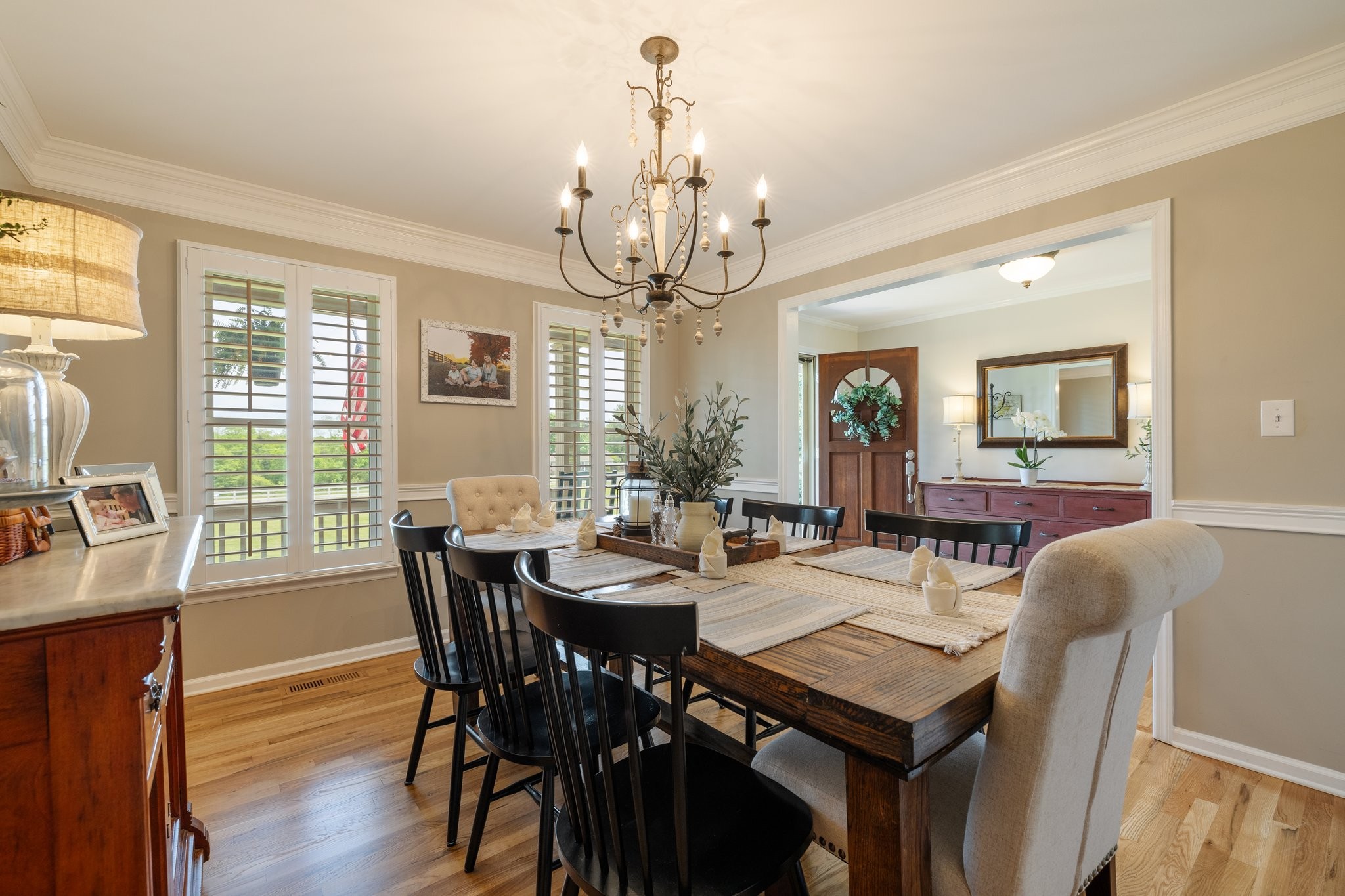 6223 Ladd Road Franklin, TN 37067 - Photo 11 of 67 a view of a dining room with furniture window and wooden floor