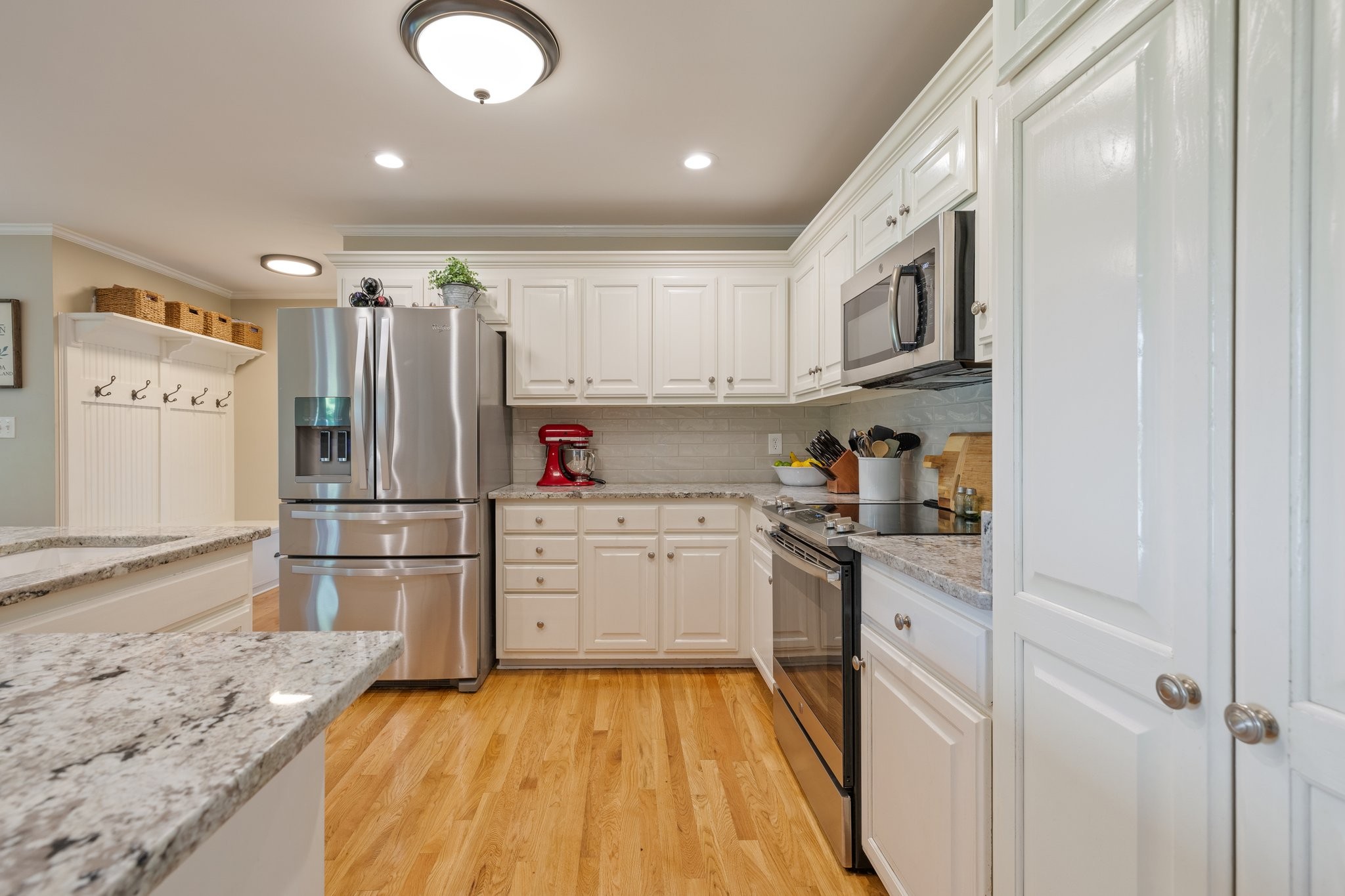 6223 Ladd Road Franklin, TN 37067 - Photo 16 of 67 a kitchen with a refrigerator and a sink